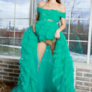 Rosie Lauren is beautiful in her big green gown. She takes it off and shows her shaved pussy.