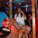 Shameless Nastia shows pussy at beach bar