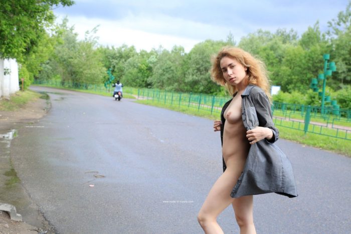 Sweet blonde Nara posing on motorcycle with a stranger