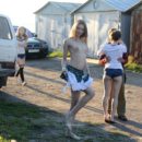 Three hot girls undresses in front of strangers
