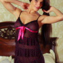 Luscious breasts and a lovely smile  Yanika A is stunning in her aubergine lingerie