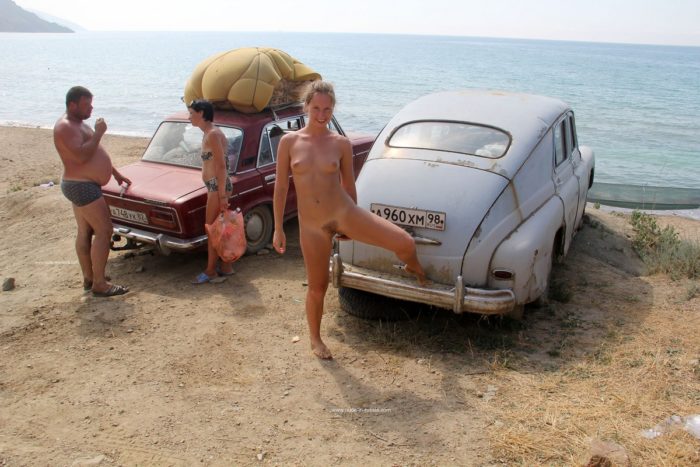 Margarita S with unshaved pussy near very old car
