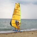 Girl Olga W learns to windsurf