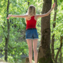 Maria Rubio takes off her red tank top and skinny shorts and strut bare naked by the riverbank.