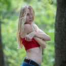 Maria Rubio takes off her red tank top and skinny shorts and strut bare naked by the riverbank.