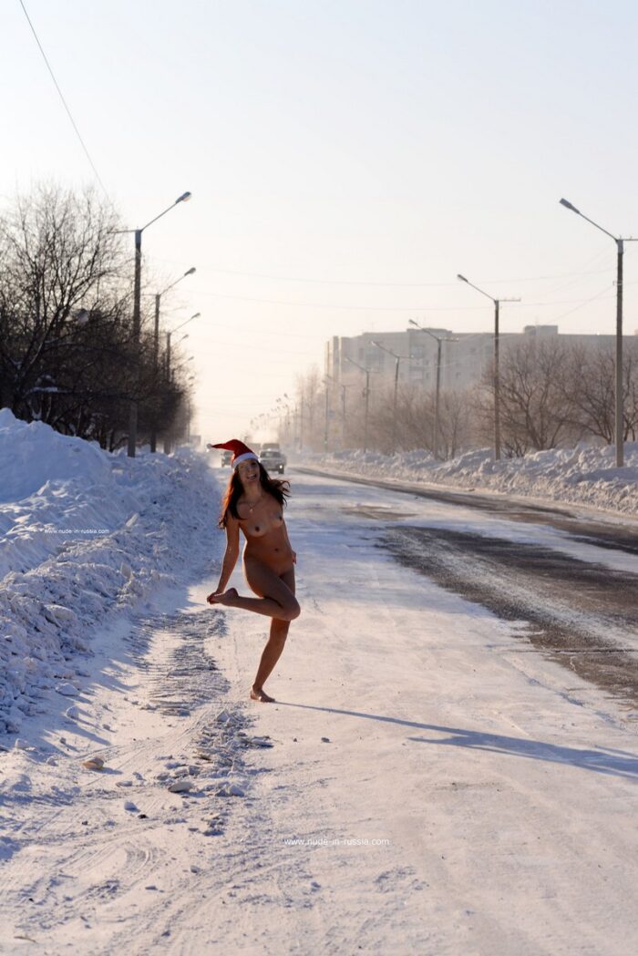 Tattoed Marina G posing naked on snowy street