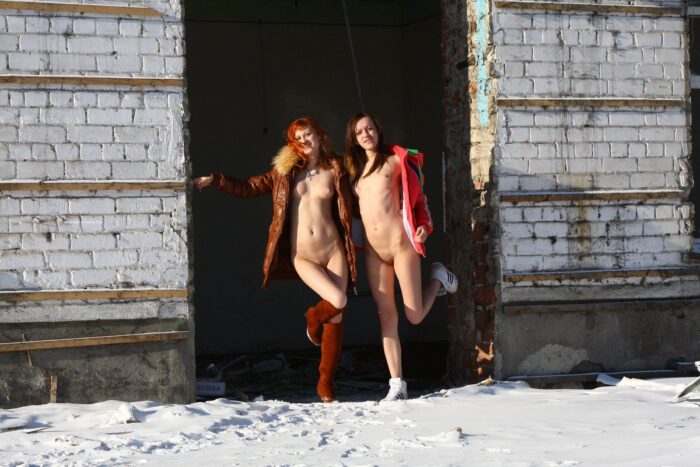 Two hot girls posing at abandoned house