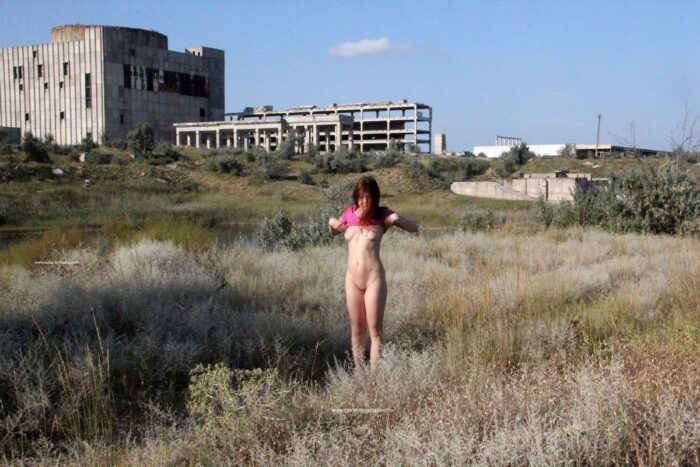 Young redhead Renara at Crimean nuclear power plant
