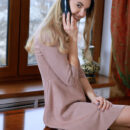 Beautiful Valencia undress and sits with legs wide open on the table showing off her bootylicious sexy physique.