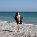 Jana A asks some questions from artists on the beach without clothes
