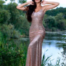 Martina Mink is a site in her long sparkling gown. She goes nude reveleaing her beautifully tanned body.