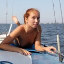 Redhead Margarita S shows her great ass on the boat