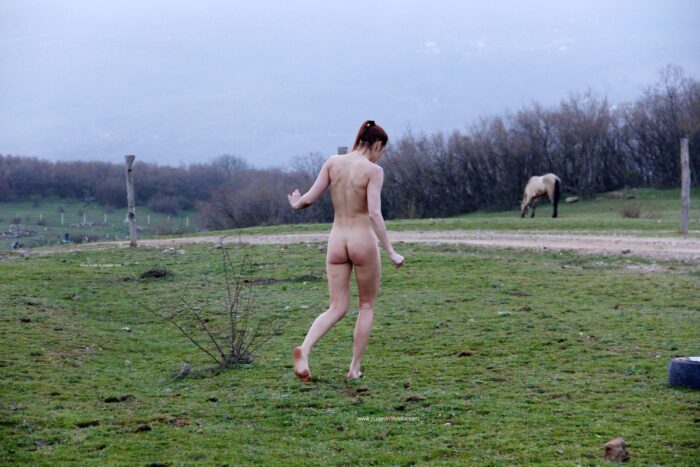 Russian teen Jana A shows her perfect ass at paintball field