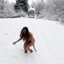 Russian teen girl Dana throwing snow
