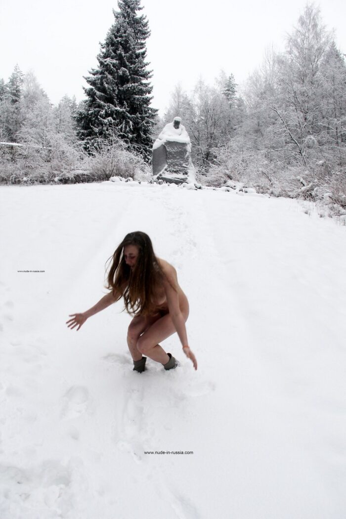 Russian teen girl Dana throwing snow