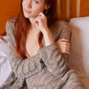 Stunning red haired Sherice disrobe her self on the bed and uncover her Slim sexy body and manicured coochie.