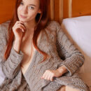 Stunning red haired Sherice disrobe her self on the bed and uncover her Slim sexy body and manicured coochie.