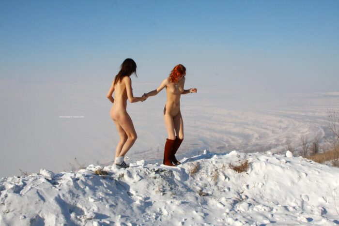 Two russian girls show pussies at the top of the quarry