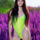 Aleksandrina strikes a pose by the lavender field wearing her neon yellow thong bodysuit. She takes it off and show off her bootylicious sexy figure.