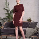 Jerricka takes off her dress and charmingly flaunts her petite sexy body on the gray sofa.