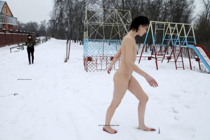 Russian girl Lia A shows pussy at winter playground