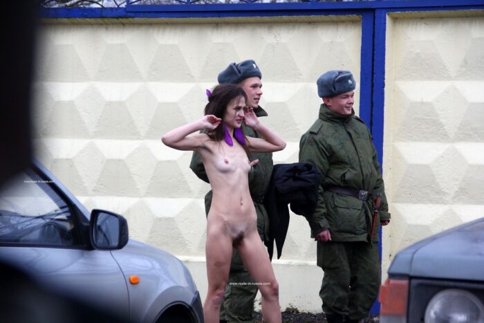 Skinny Nadeshda N posing with two soldiers naked