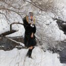 Busty blonde Varvara at winter river