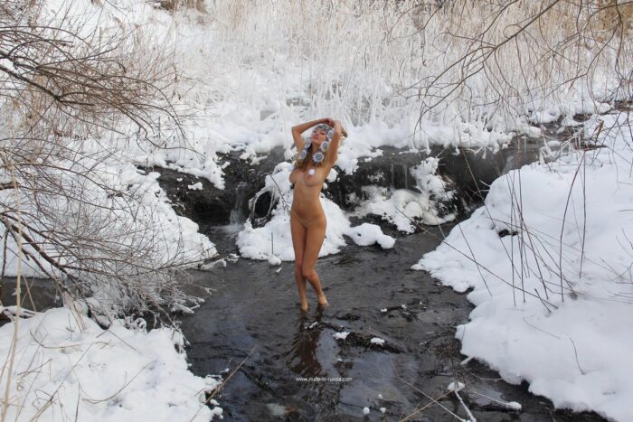 Busty blonde Varvara at winter river
