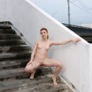 Redheaded teen Orabelle A shows pussy on public bridge