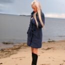 Russian blonde Ilona posing naked on a cold beach