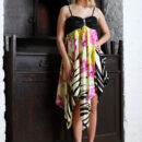 The fun and carefree Oliwia undressing   her beautiful flowing dress baring her   delectable gorgeous body and pink, juicy   pussy as she and sprawls all over the   room.