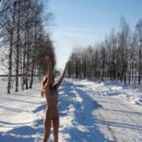 Young russian pornstar Gina Gerson plays with a snow
