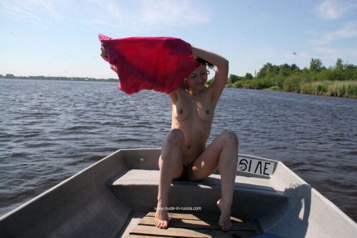 Hairy pussy girl Irena K swims on a boat