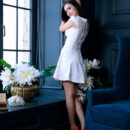 Velana looks so chic in her white dress and red pumps. She undresses, flaunts her huge knockers and sits on the velvet chair then lifts her legs up to give an open view of her smooth pinkish punani.