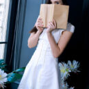 Velana looks so chic in her white dress and red pumps. She undresses, flaunts her huge knockers and sits on the velvet chair then lifts her legs up to give an open view of her smooth pinkish punani.