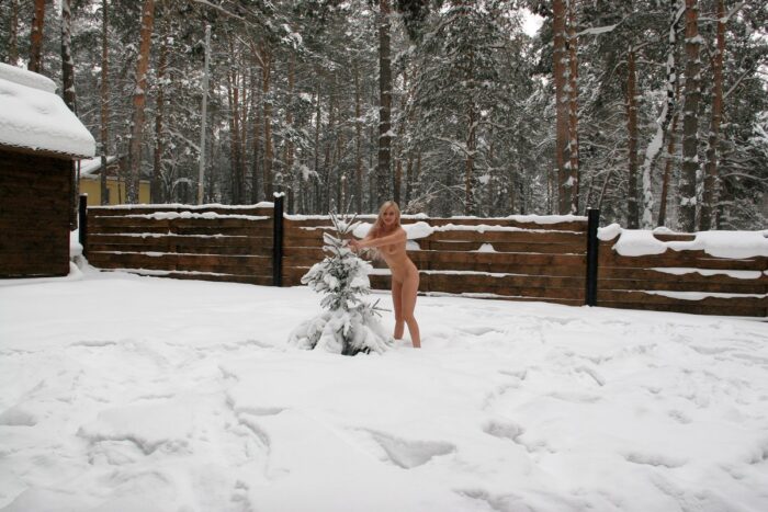 Hot blonde Olesia K plays in snow after sauna