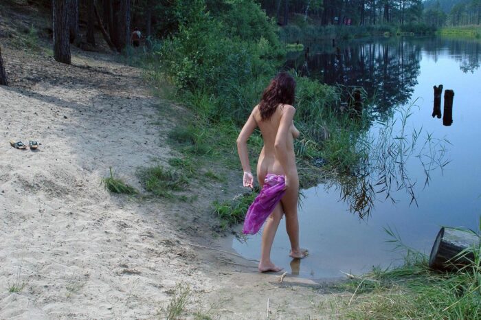 Russian girl Oxana F walks naked at forest