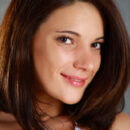 Womanly allure with sweeping curves, especially Yanika`s puffy, round breasts, wide and shapely hips, and her perfectly toned rump.