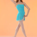 Annett gives a sample of her graceful moves as a ballerina, stretching and bending her flexible body while showcasing her intimate details.