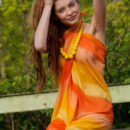 Indiana poses confidently outdoors   showcasing her gorgeous physique   and beautiful breasts with perky   nipples and baring her sexy curves   in front of the camera.