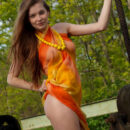 Indiana poses confidently outdoors   showcasing her gorgeous physique   and beautiful breasts with perky   nipples and baring her sexy curves   in front of the camera.