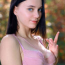 Polly Pure shows off her bootylicious flawless body outdoors. She takes off her lingerie and expose her yummy melons and hairless cunt.