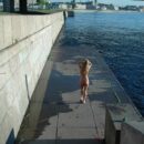 Sexy russian blonde Natalia A licks her foot near city river