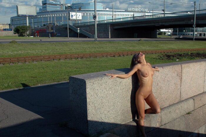 Sexy russian blonde Natalia A licks her foot near city river