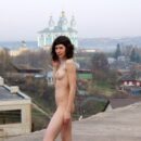 Tall brunette Ekaterina S posing naked outdoors