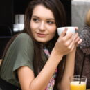 With her sweet yet teasing smile and her oh-so-delectable pink fleshy bits Leila strips and poses uninhibited on the chair.