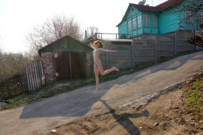 Beautiful russian babe Ekaterina S posing at village road