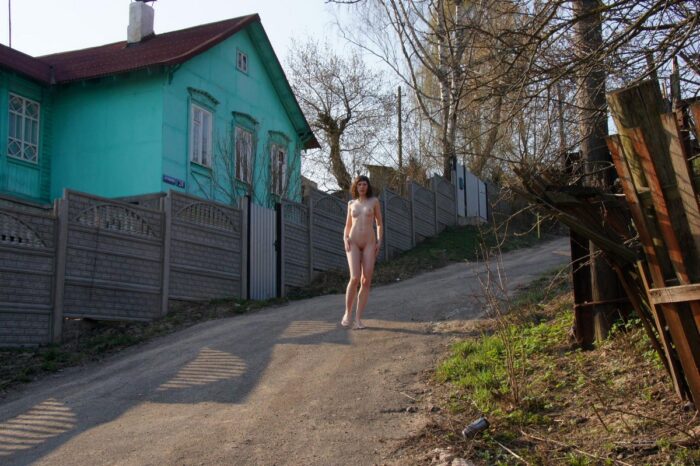 Beautiful russian babe Ekaterina S posing at village road