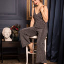 Diana Jam stunningly strip off her grey jumpsuit and reveal her bootylicious sexy figure while posing on the chair and bed.