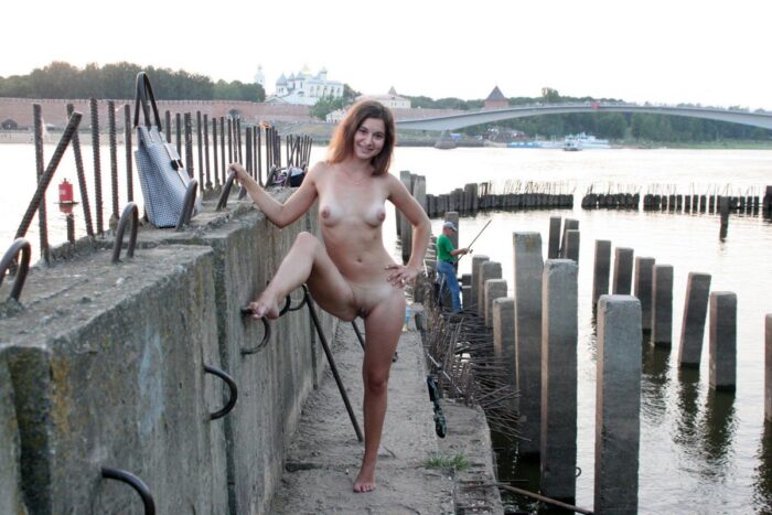 Lovely russian teen Vika D posing with fisherman